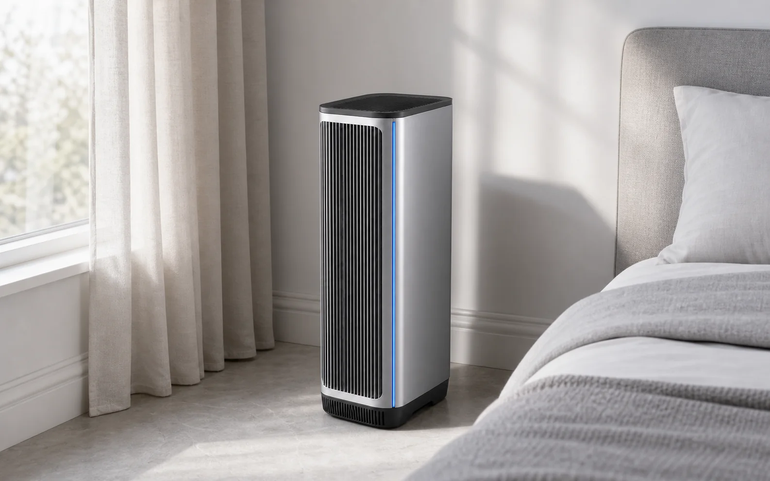 Air One purifier beside a pale upholstered bed in morning light